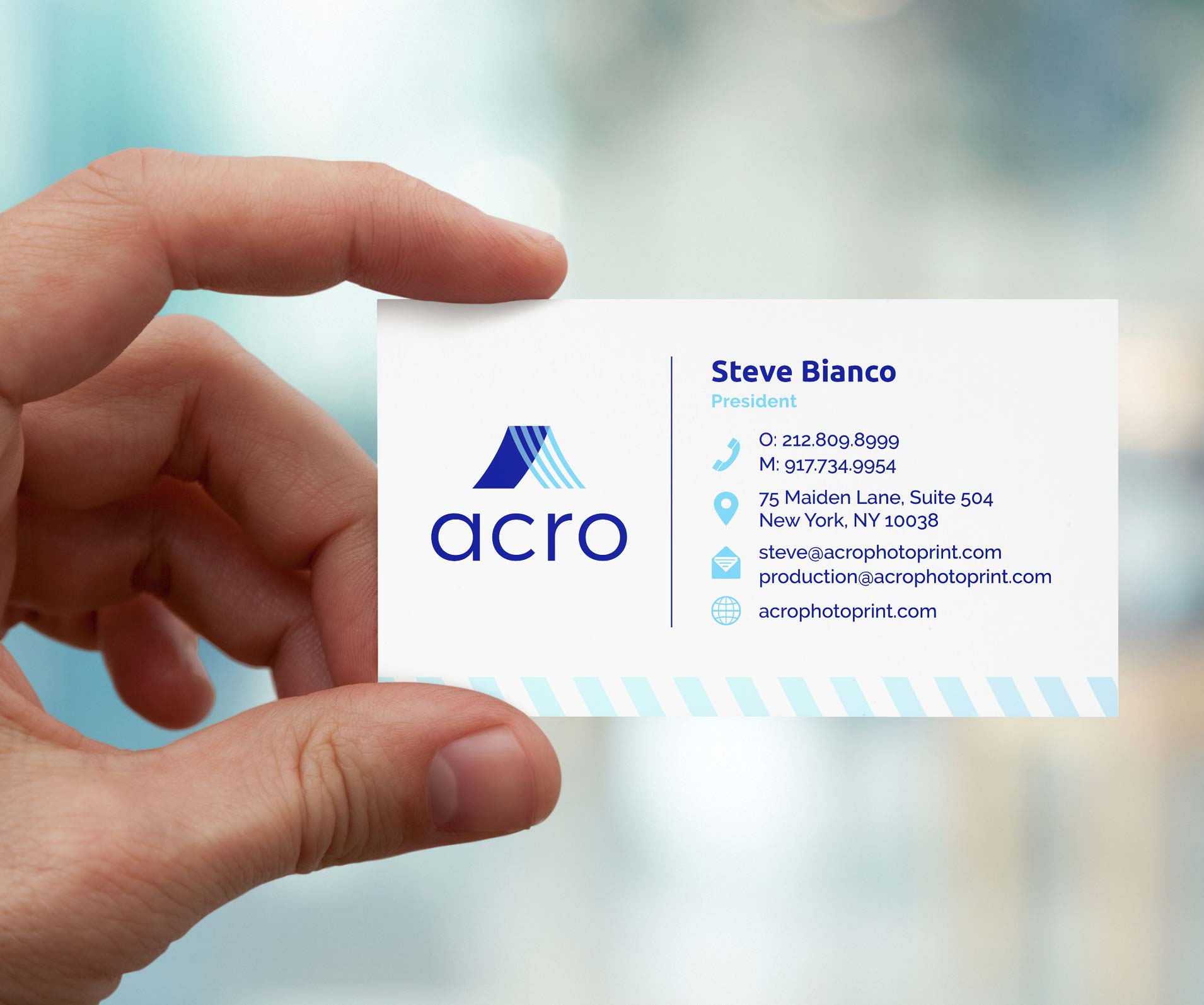acro business card in a person's hand