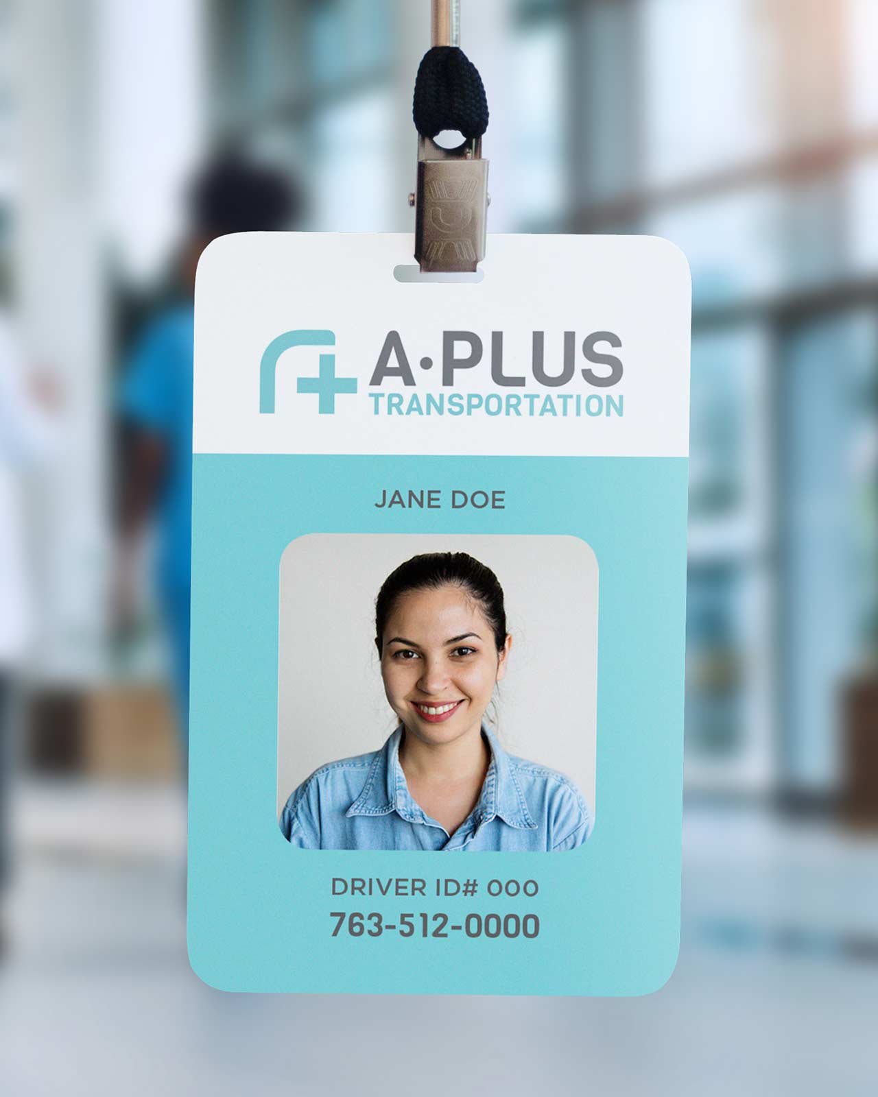 A close-up of an A-Plus ID badge.
